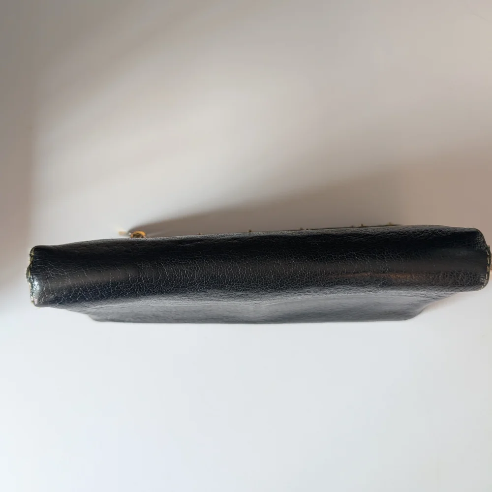 Louis Vuitton Black Suhali Leather Zippy Wallet